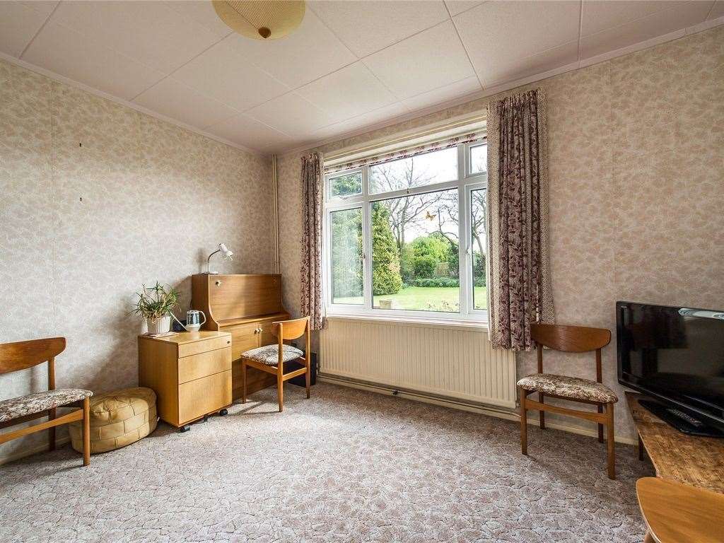 The four-bedroom has retro interiors and a sizeable back garden. Photo: Zoopla