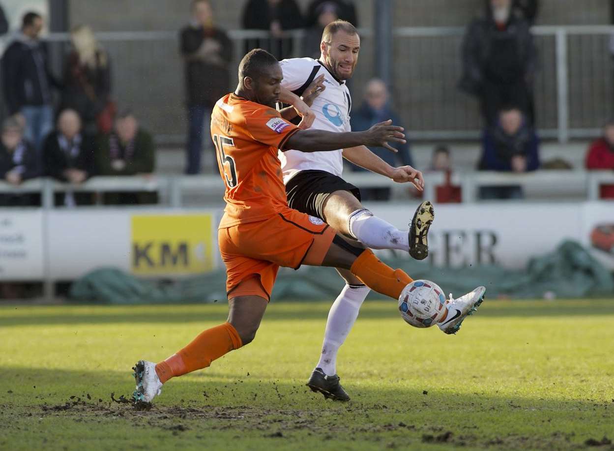 Mat Mitchel-King gets his foot in against Hereford United Picture: Andy Payton
