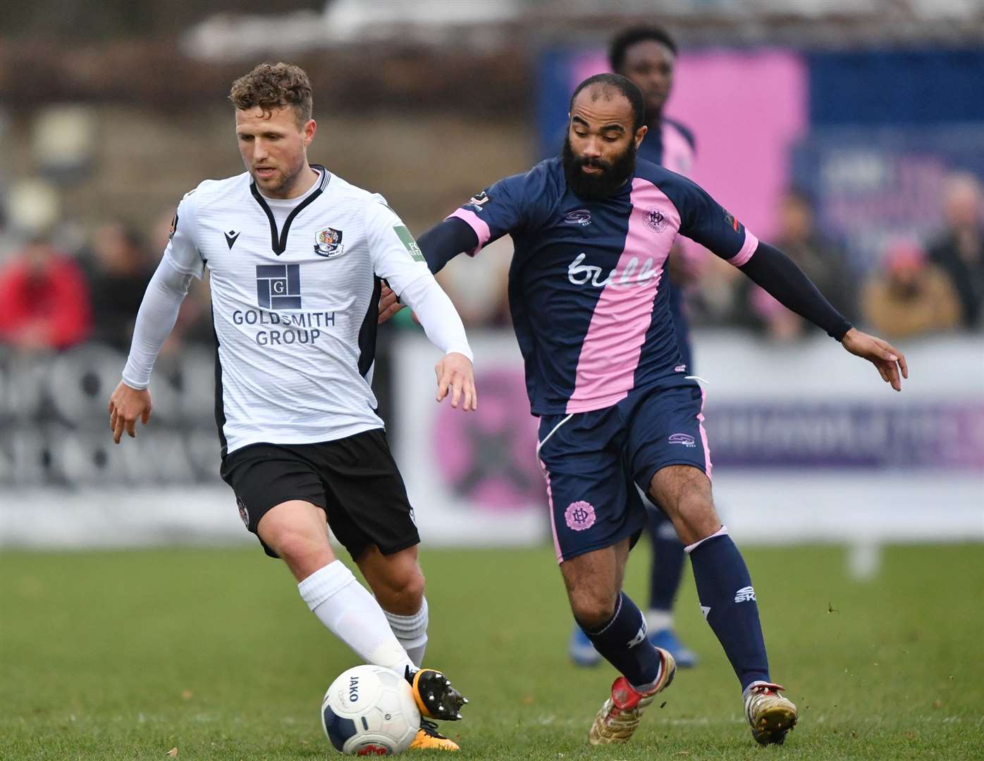 Dartford's Billy Crook is closed down by Dulwich's Dominic Vose. Picture: Keith Gillard