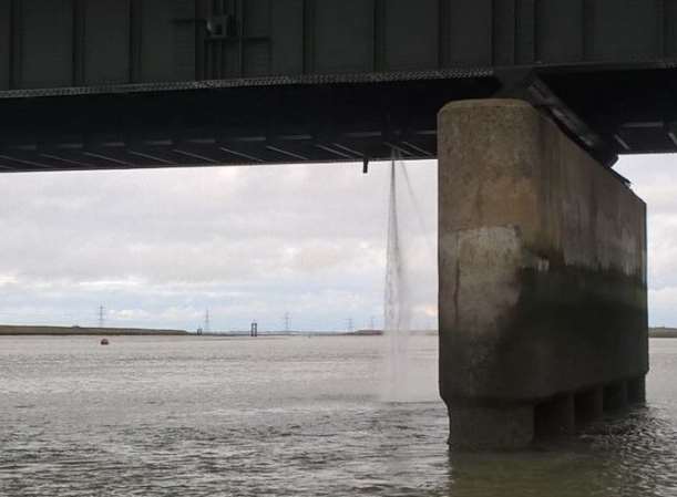Water gushing from the bottom of Kingsferry Bridge. Picture: Twitter