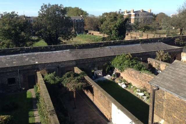 A view over some of the restored gardens of the Georgian terraced houses in Sheerness dockyard
