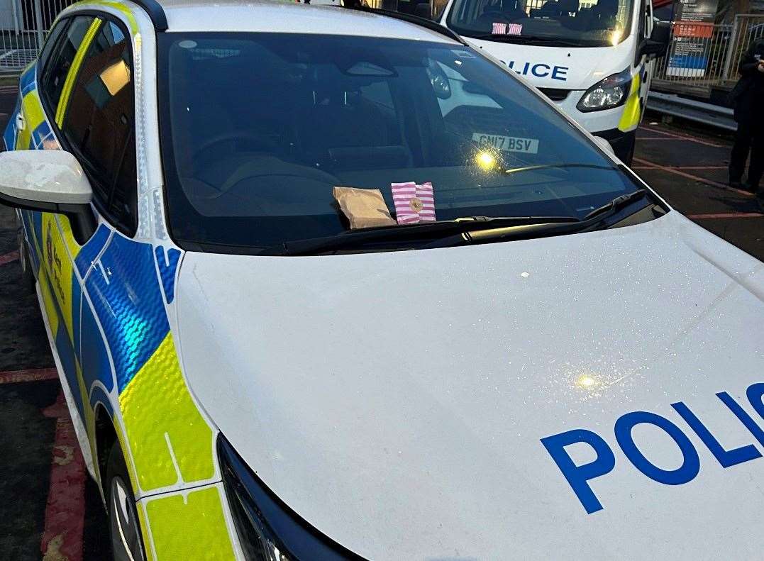 Swale police officers returned to their cars after a 10 hour shift to find someone had left sweets on their windscreen