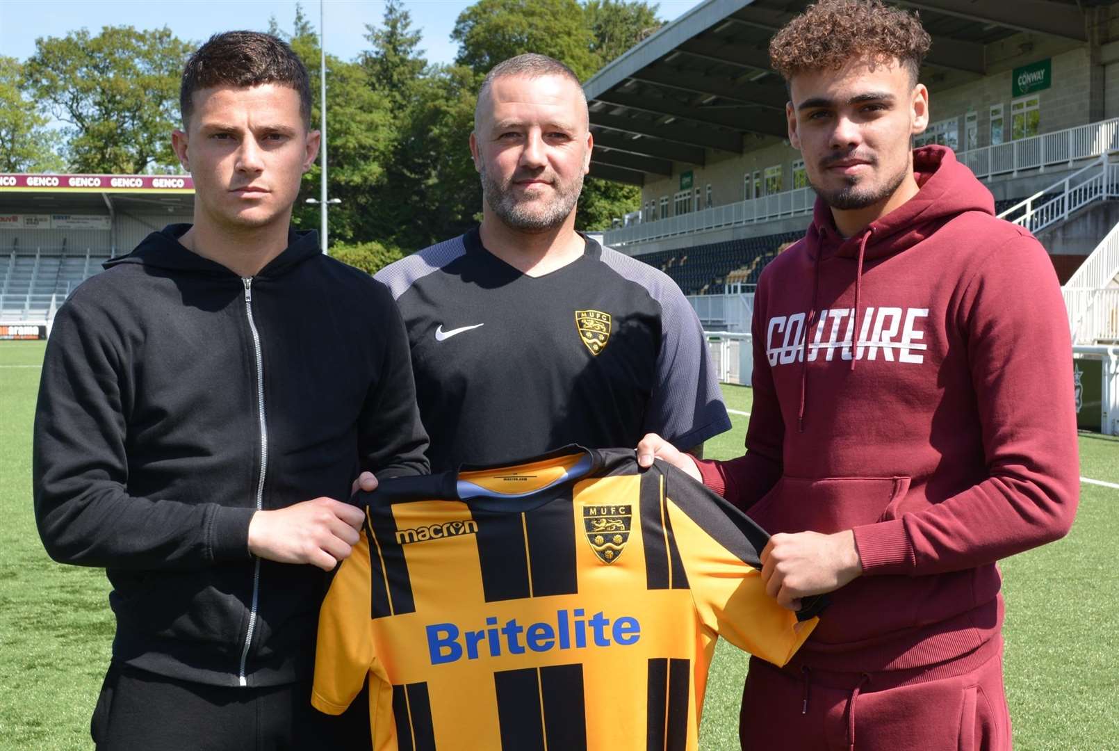 From left, Jack Paxman, Maidstone boss Jay Saunders and Michael Phillips Picture: Maidstone United FC