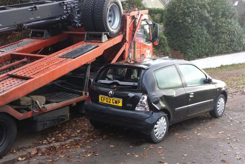 A black Renault Clio was badly damaged