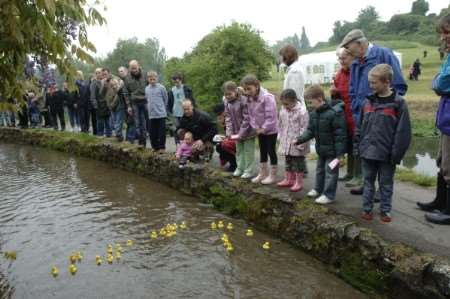 Nice weather for ducks - the annual duck race went ahead in Loose, despite the miserable weather. Picture: John Wardley