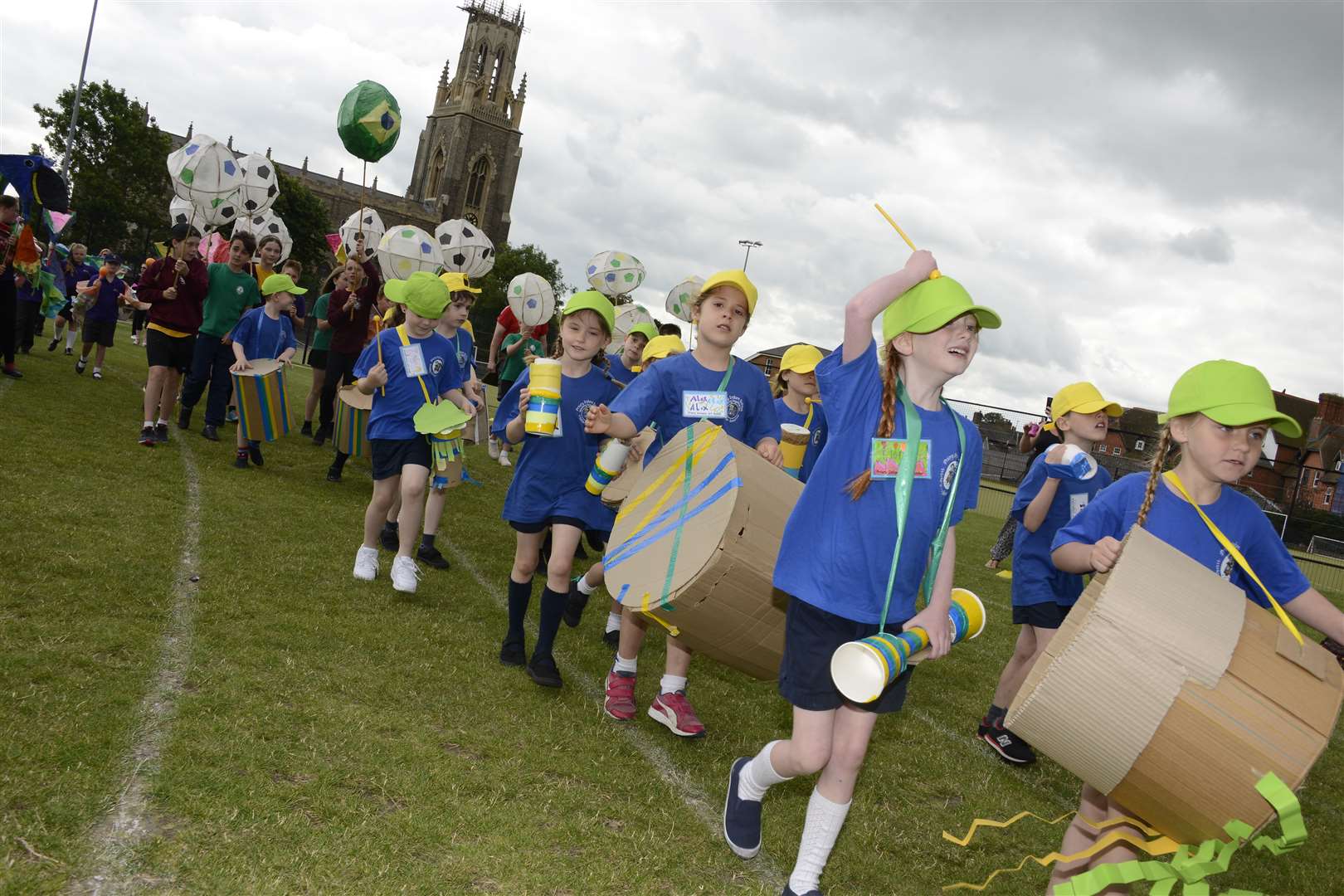 Priory Infants Primary School joined the parade with homemade drums and colorful tissue paper streamers