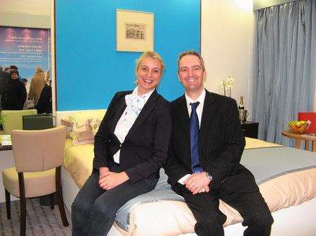 The Cruise Show, Olympia. Saga Group's Louse Batty and James Gambling show off the cabin mock-up.