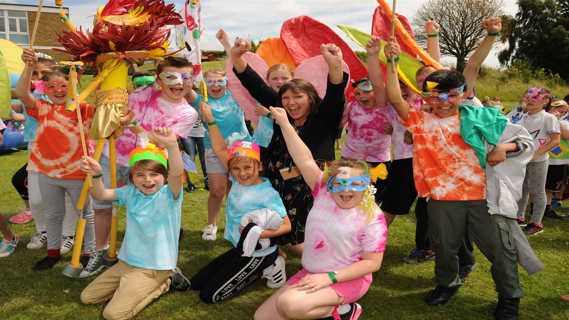 Angela Sandow, head of Saxon Way Primary School, celebrating with pupils