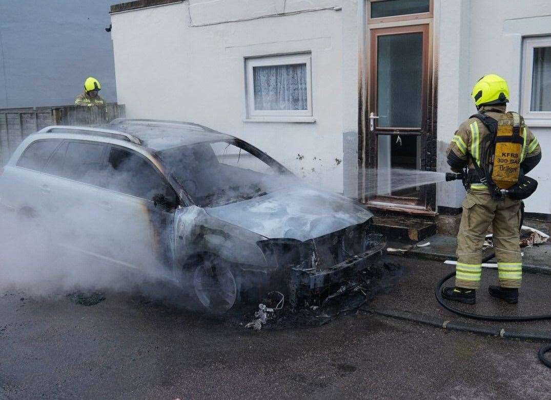 Firefighters douse one car destroyed by fire near Grange Road, Ramsgate Picture: @_EdThompson