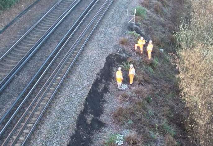Engineers at the scene of the landslip in Newington at the weekend. Picture: Southeastern