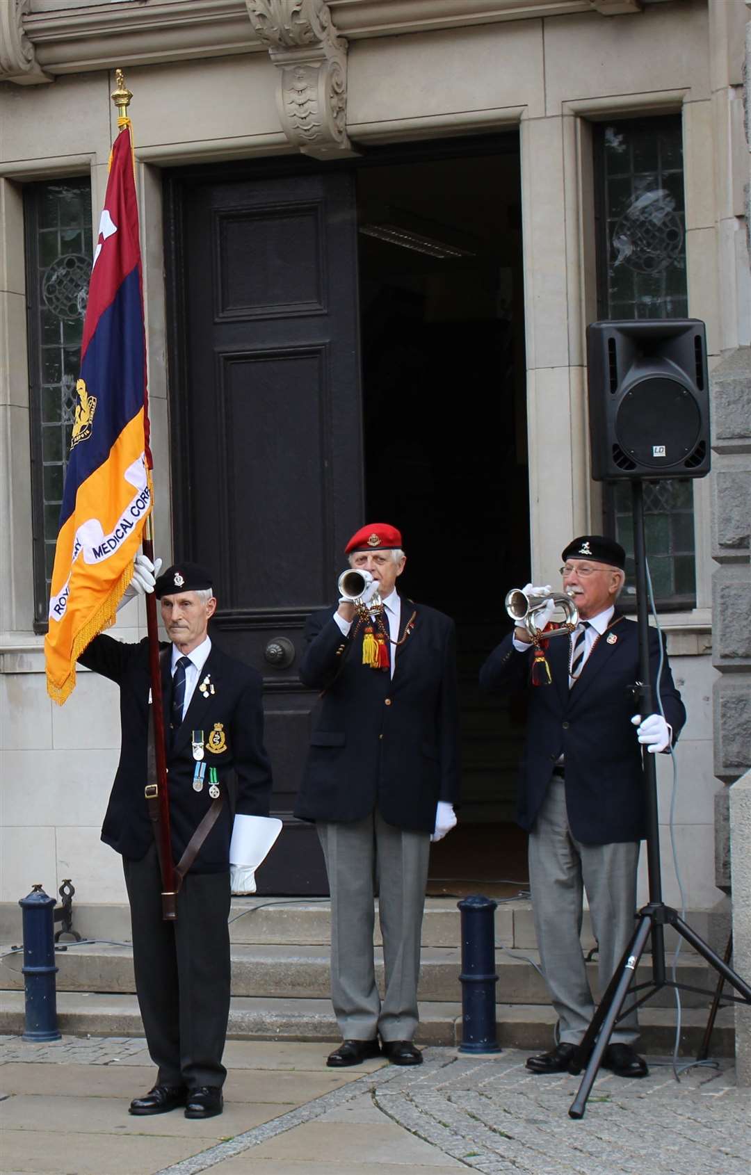 Buglers John Leigh and Barry Knight play reveille