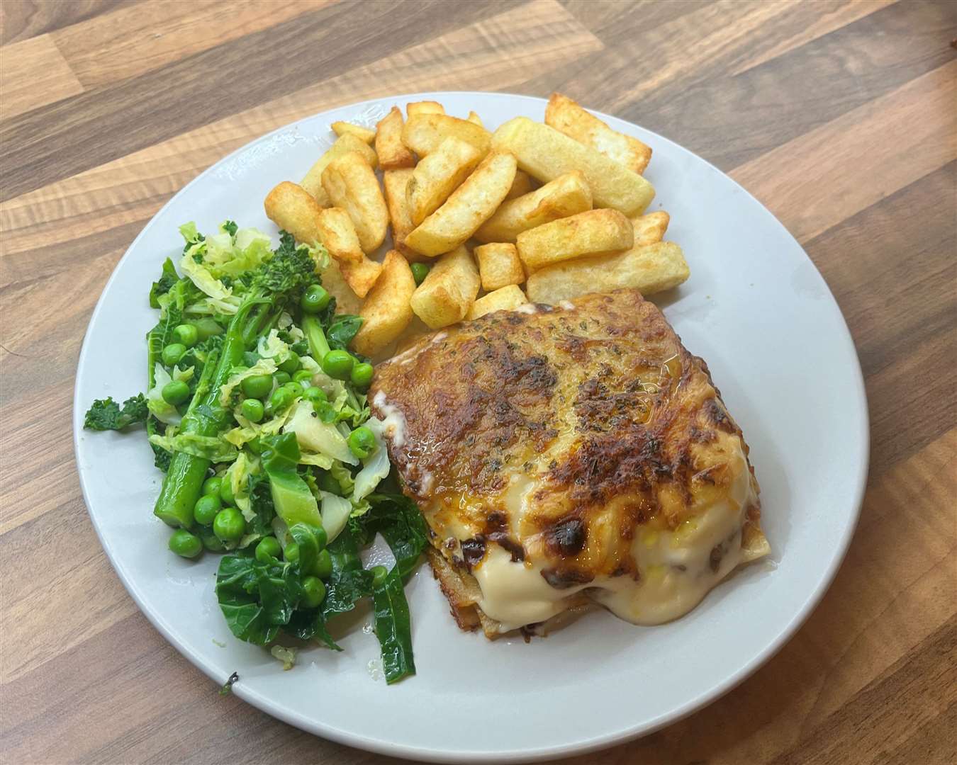 The Asda main course of lasagne, triple-cooked chips and green vegetables