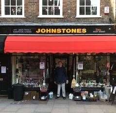 Archie Johnstone outside his shop