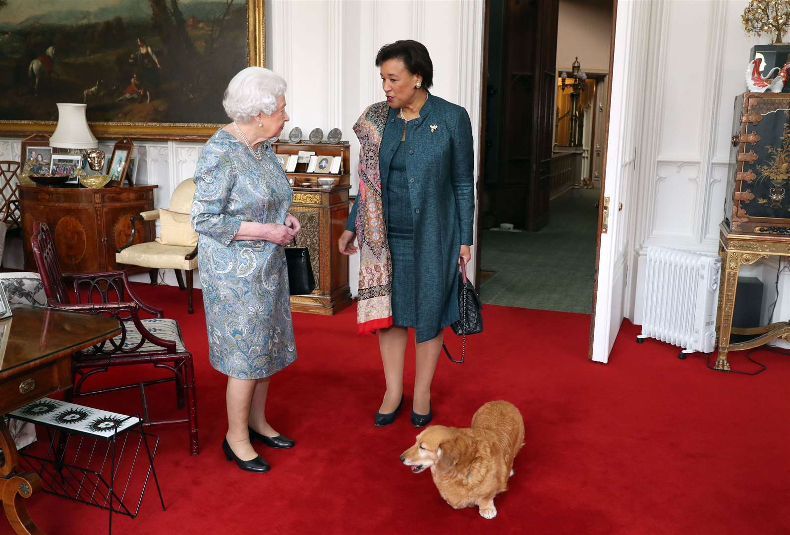 The Queen and a companion greet Commonwealth secretary-general Baroness Scotland at Windsor Castle (Andrew Matthews/PA)