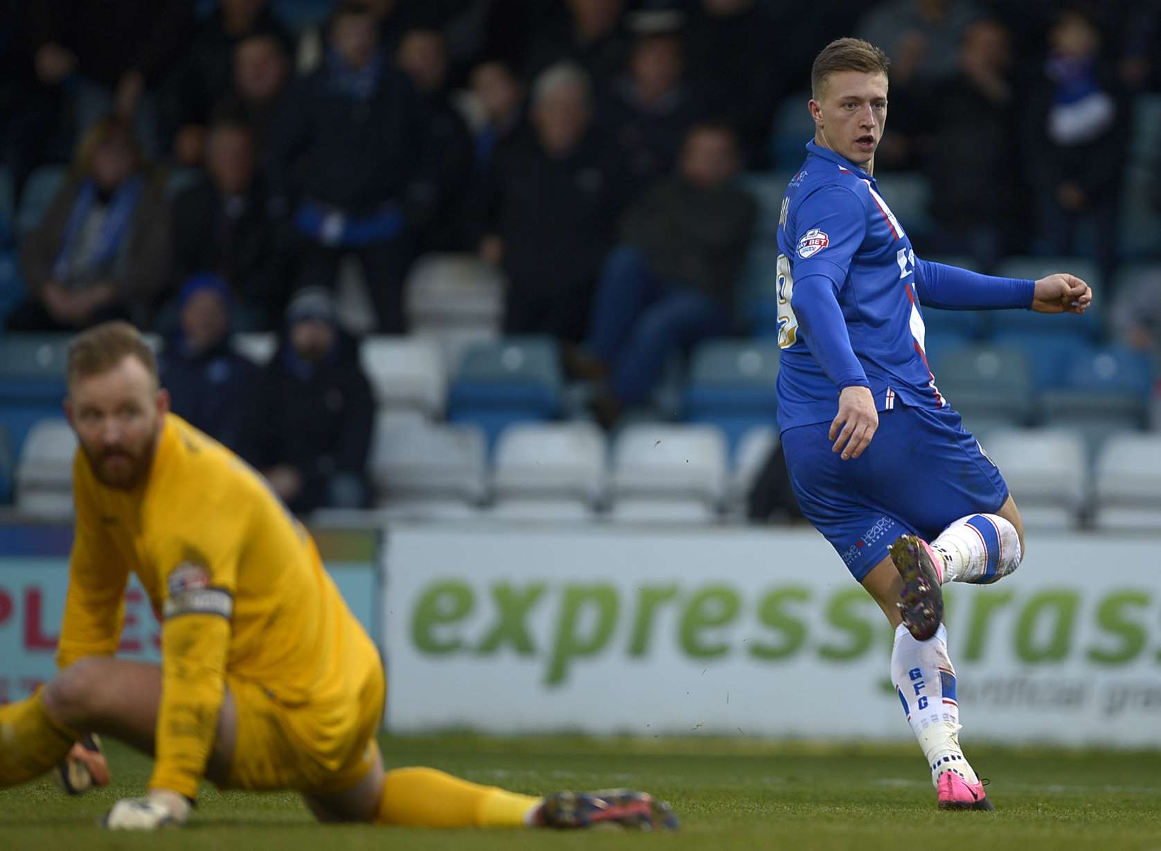Luke Norris scores for Gills against Peterborough. Picture: Barry Goodwin