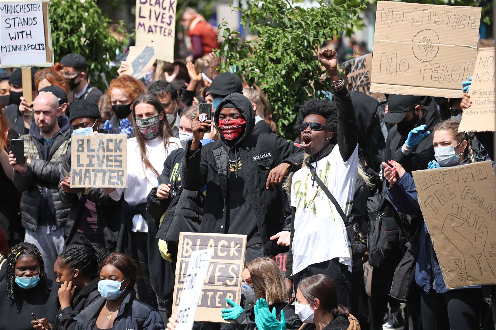 People take part in a Black Lives Matter protest rally in Manchester Piccadilly Gardens (Danny Lawson/PA)