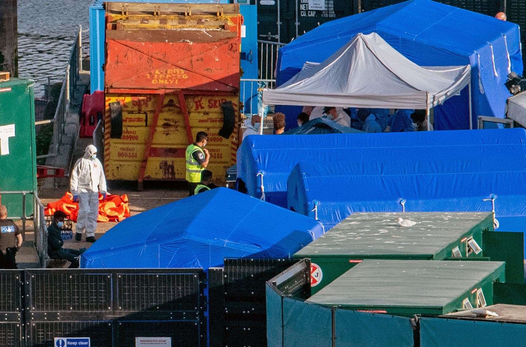 Blue control tents were set up as part of the biohazard response. Credit: Stuart Brock
