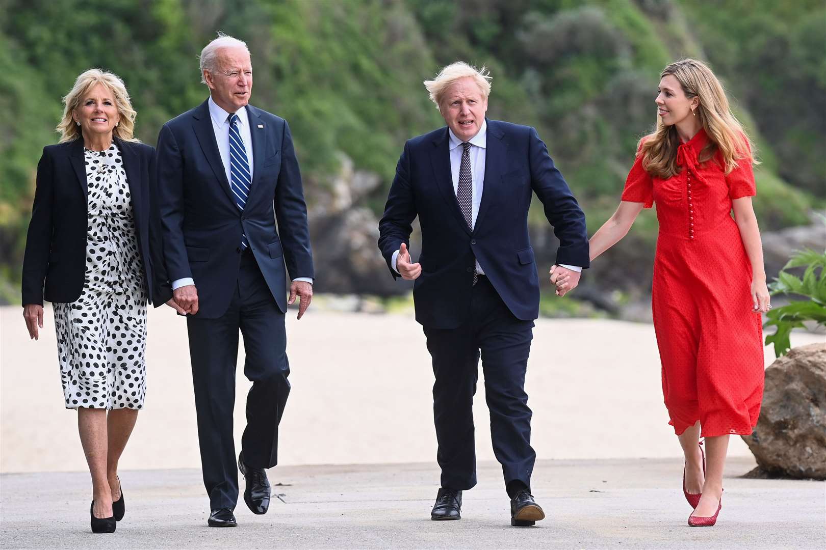 First Lady Jill Biden, US President Joe Biden, Prime Minister Boris Johnson and Carrie Johnson walk outside Carbis Bay Hotel (Toby Melville/PA)