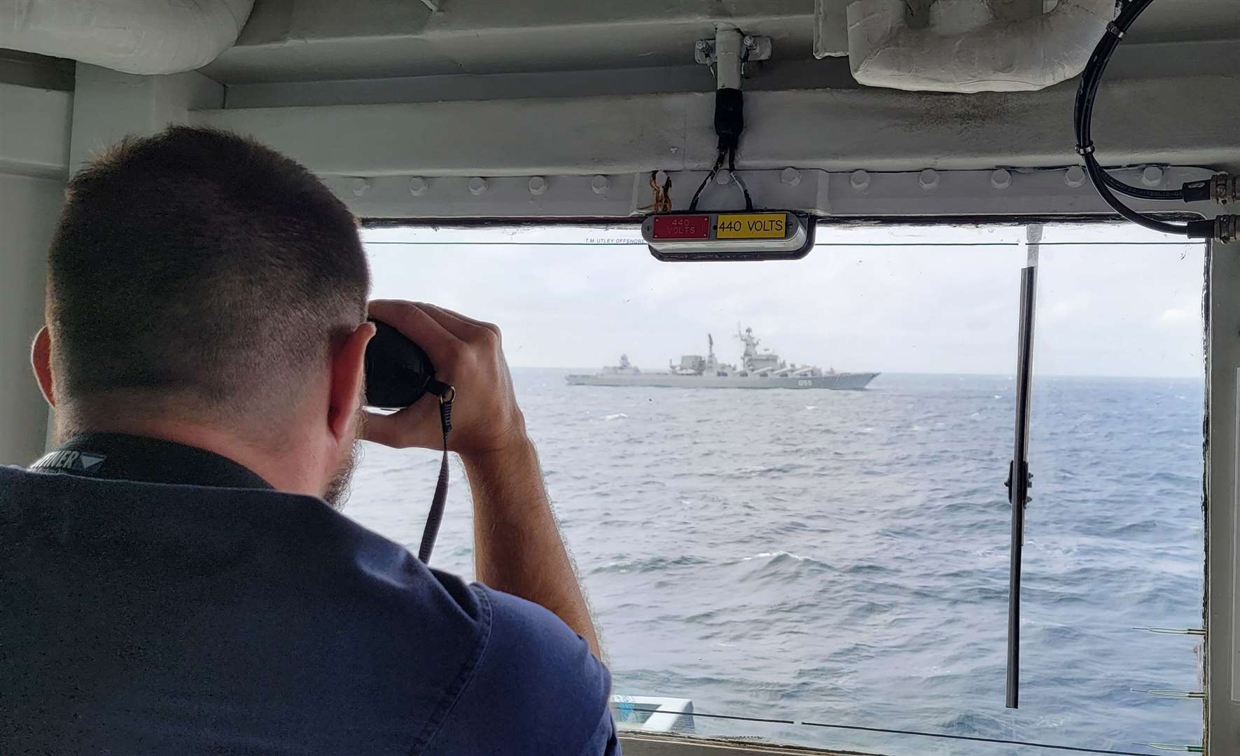 HMS Westminster maintaining a vigilant watch on Russian cruiser Marshal Ustinov. Picture: Royal Navy/Sam Bannister
