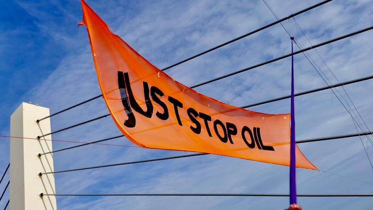The Just Stop Oil banner on the QEII Bridge. Picture: Just Stop Oil