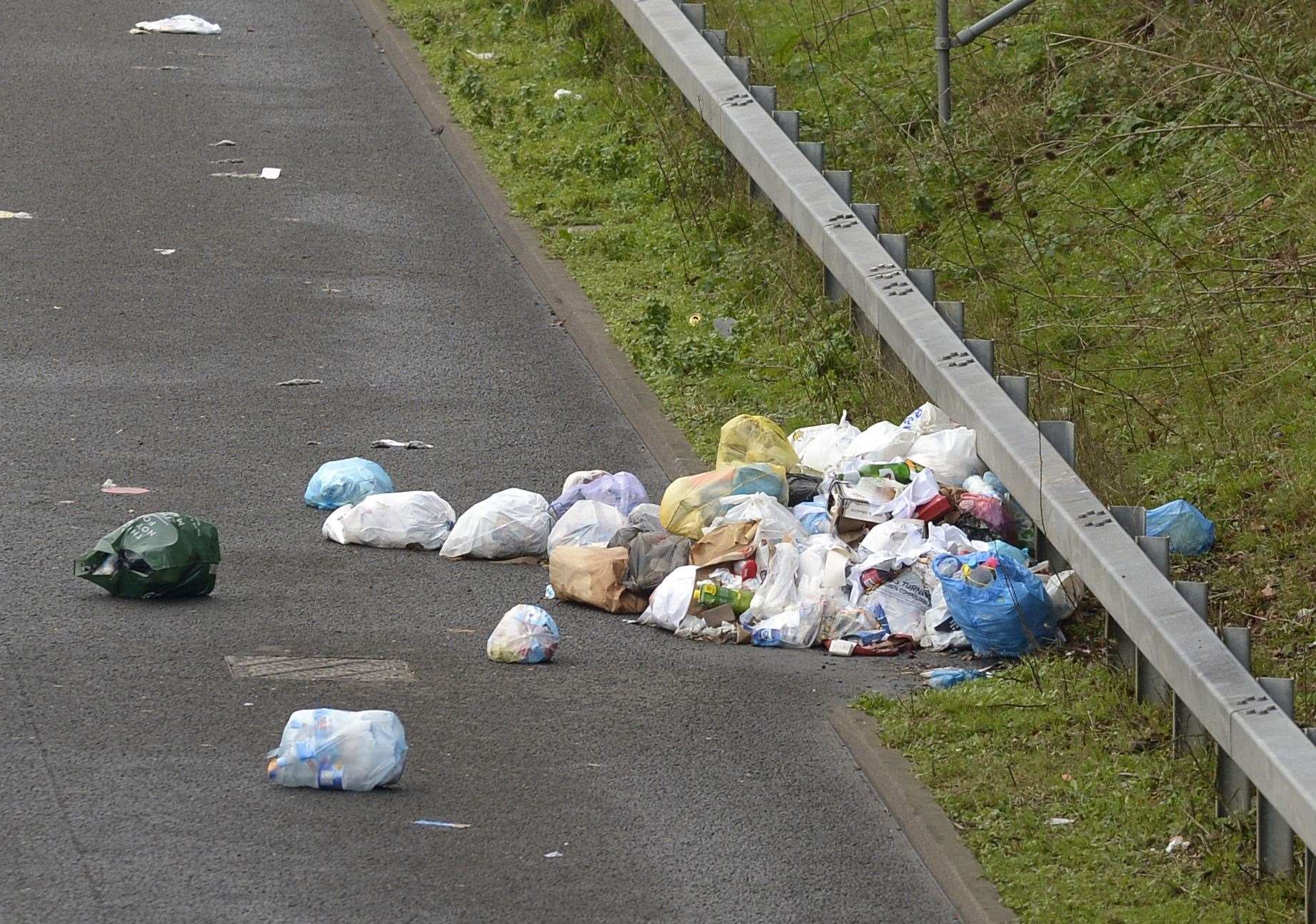 Litter at the side of the carriageway near Ashford. Picture: Barry Goodwin