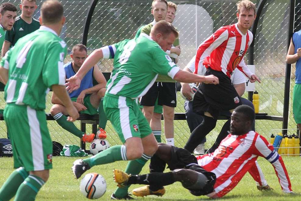 Sean Palmer dives in for Sheppey against Rusthall Picture: Roger Vaughan