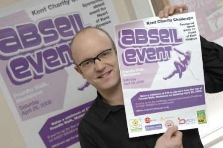 Mark Bidewell owner of Bisons with the challenge event posters