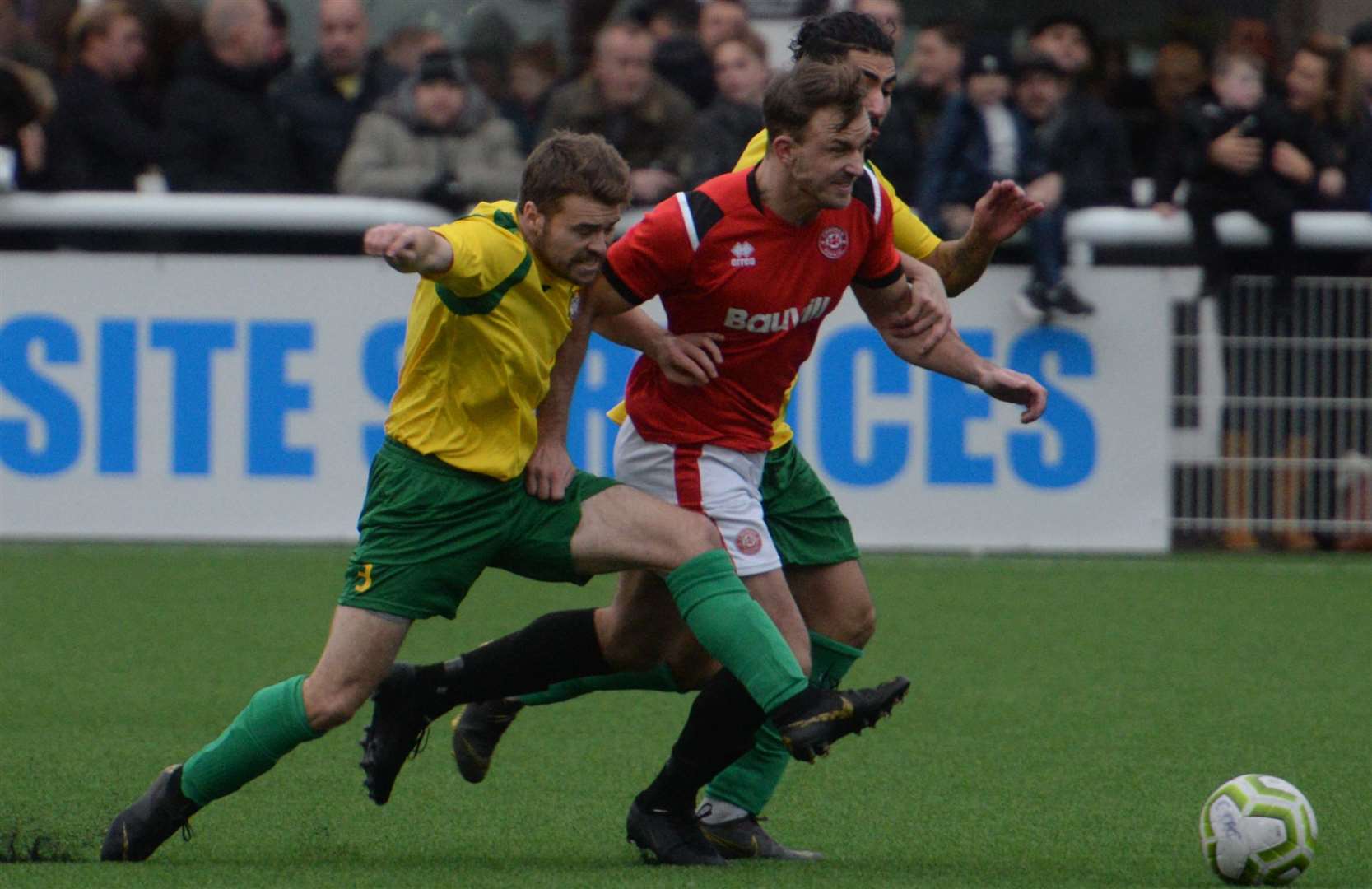 Corinthian (yellow) double up against Chatham during their FA Vase tie in January. Picture: Chris Davey