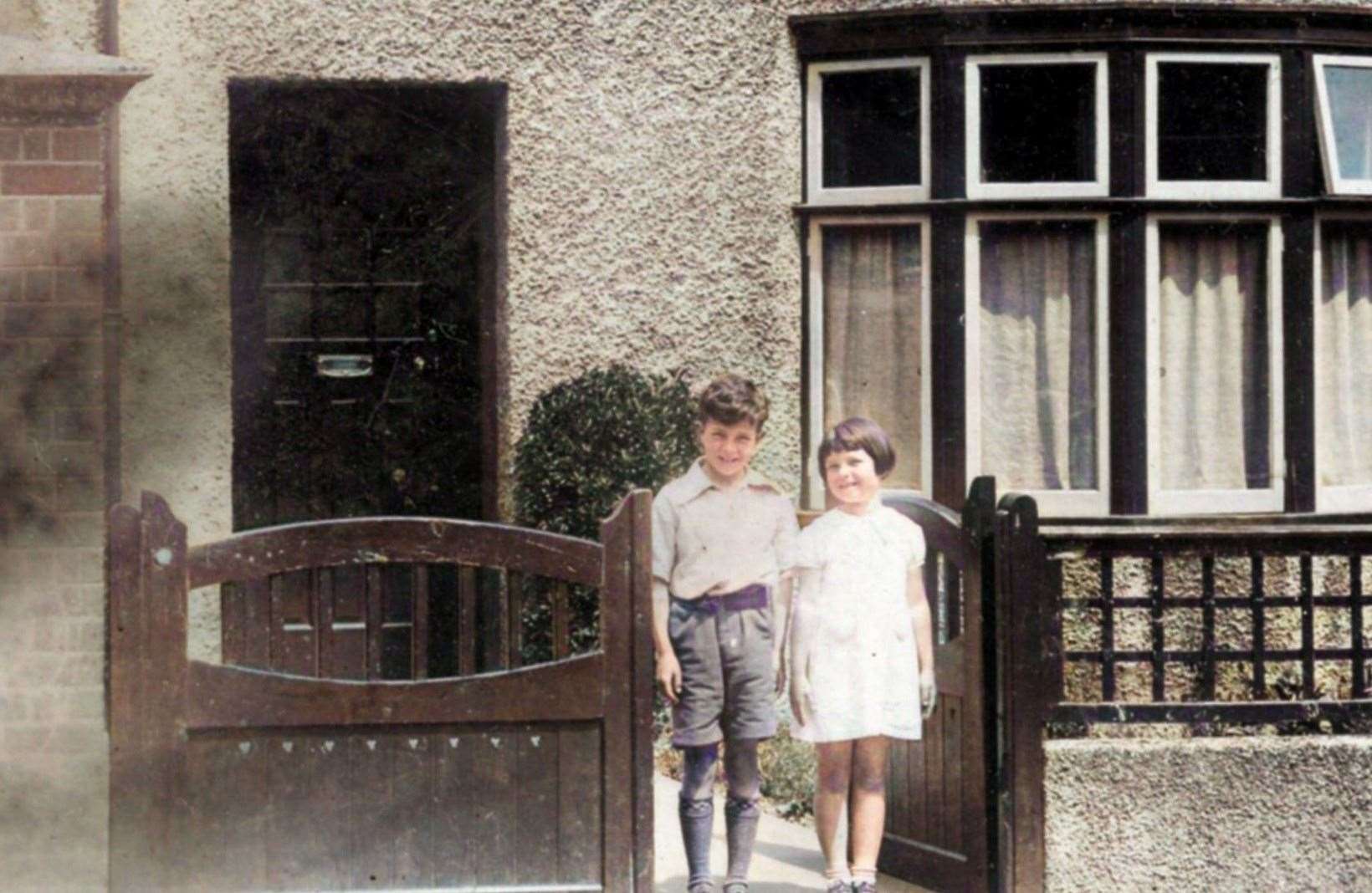Peter Spanswick and his sister Doreen at their family home, in Chart Road, Cheriton. Date unknown