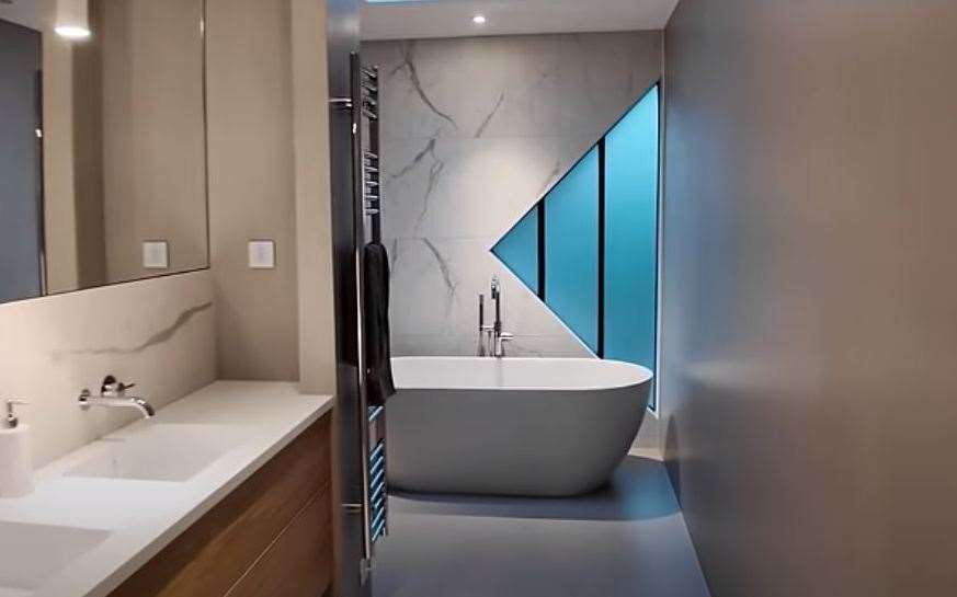 One of the many bathrooms in the sprawling property. Pic: YouTube/MattDoesFitness