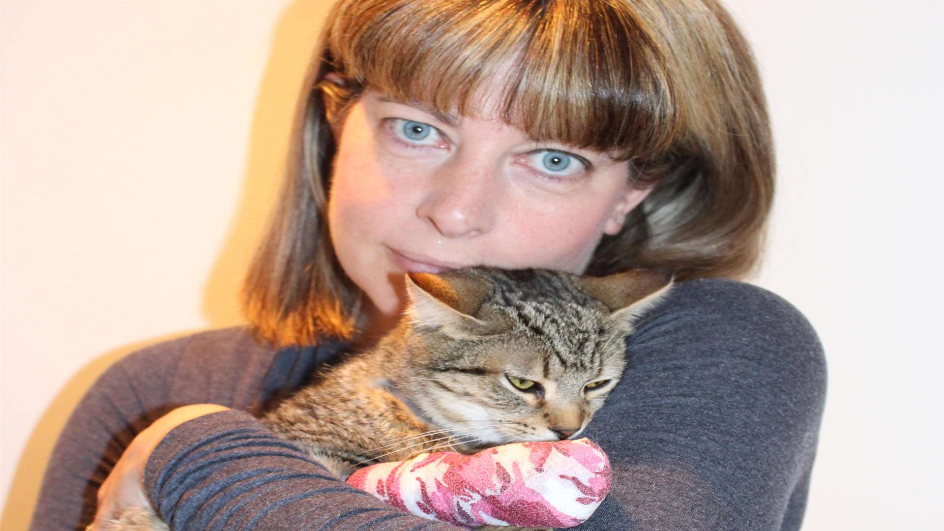 Catherine Cooper with her cat Sandy