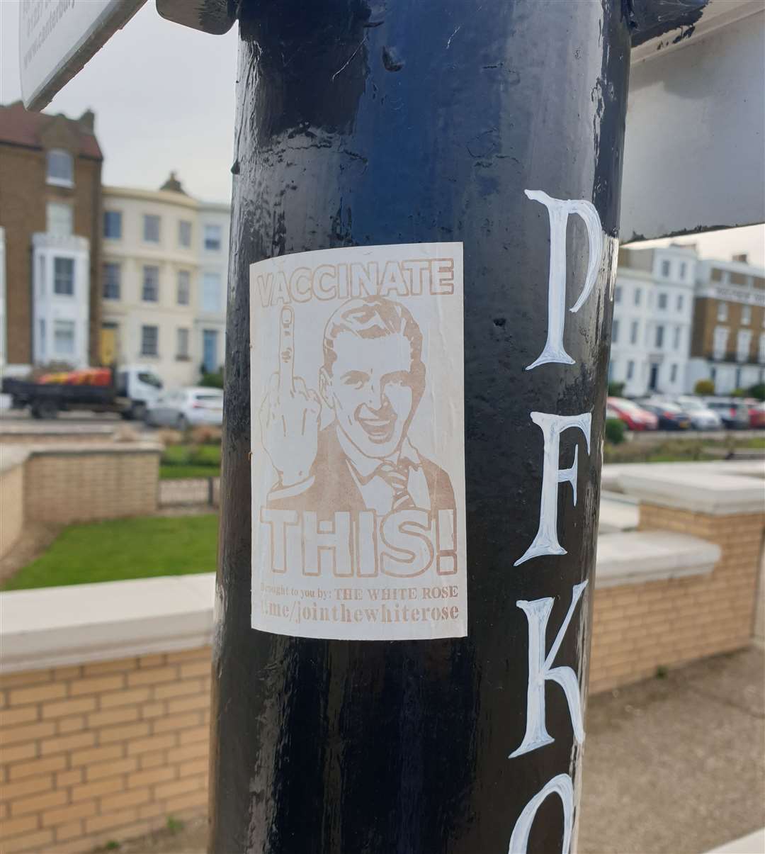 One of the anti-vaxx stickers found on Herne Bay's seafront