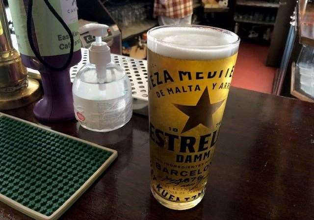 I felt compelled to join the crowd and started with a pint of Estrella