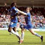 Frank Nouble celebrates scoring on his home debut