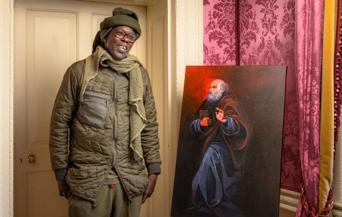 Artist Clifton Powell with his portrait of Abbot Hadrian (640-710), an African scholar in Anglo-Saxon England and the abbot of St Augustine’s Abbey in Canterbury Picture: English Heritage