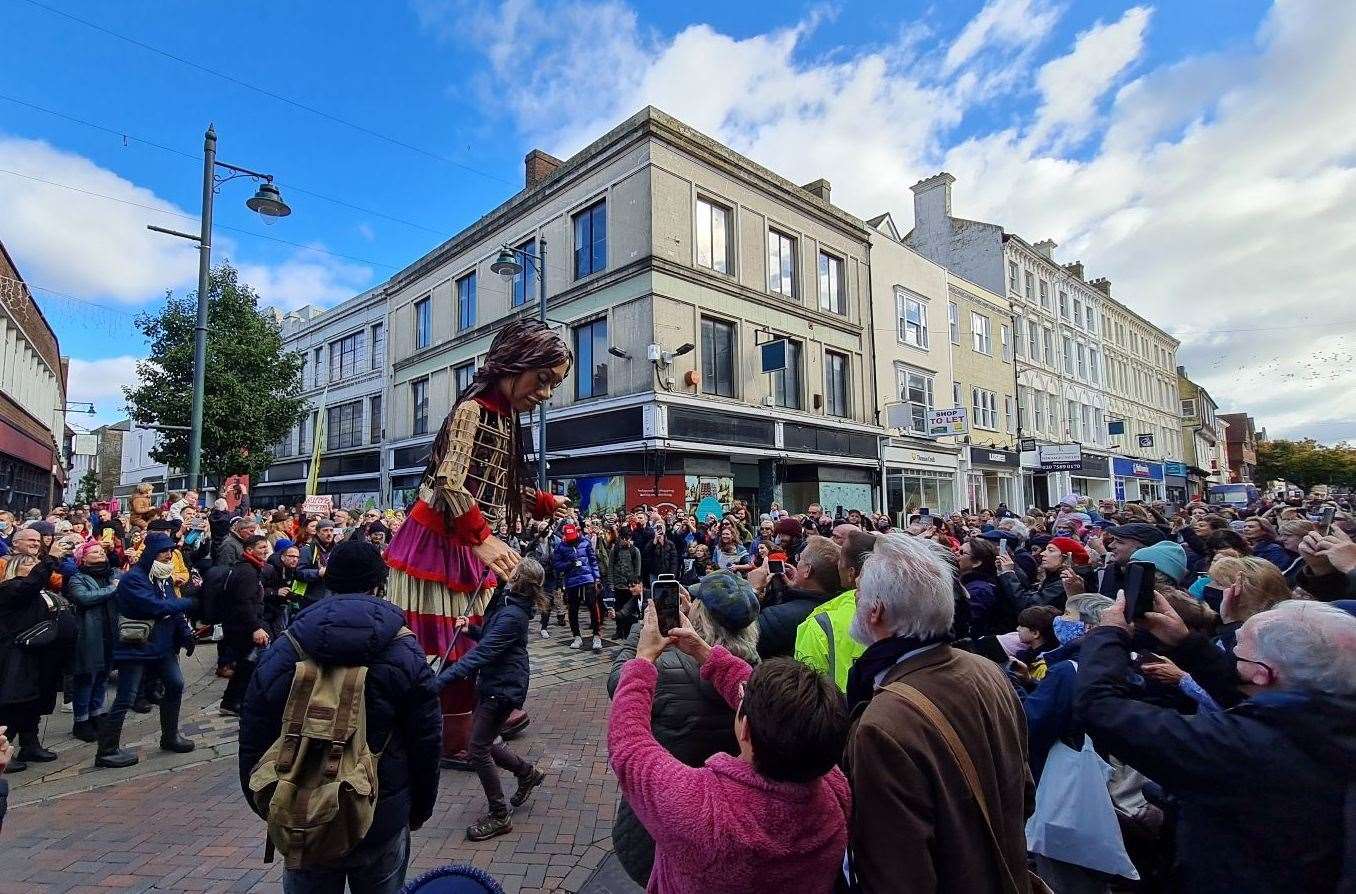 Photographers and passers-by were eager to get a glimpse of the giant puppet. Picture: Gerry Warren