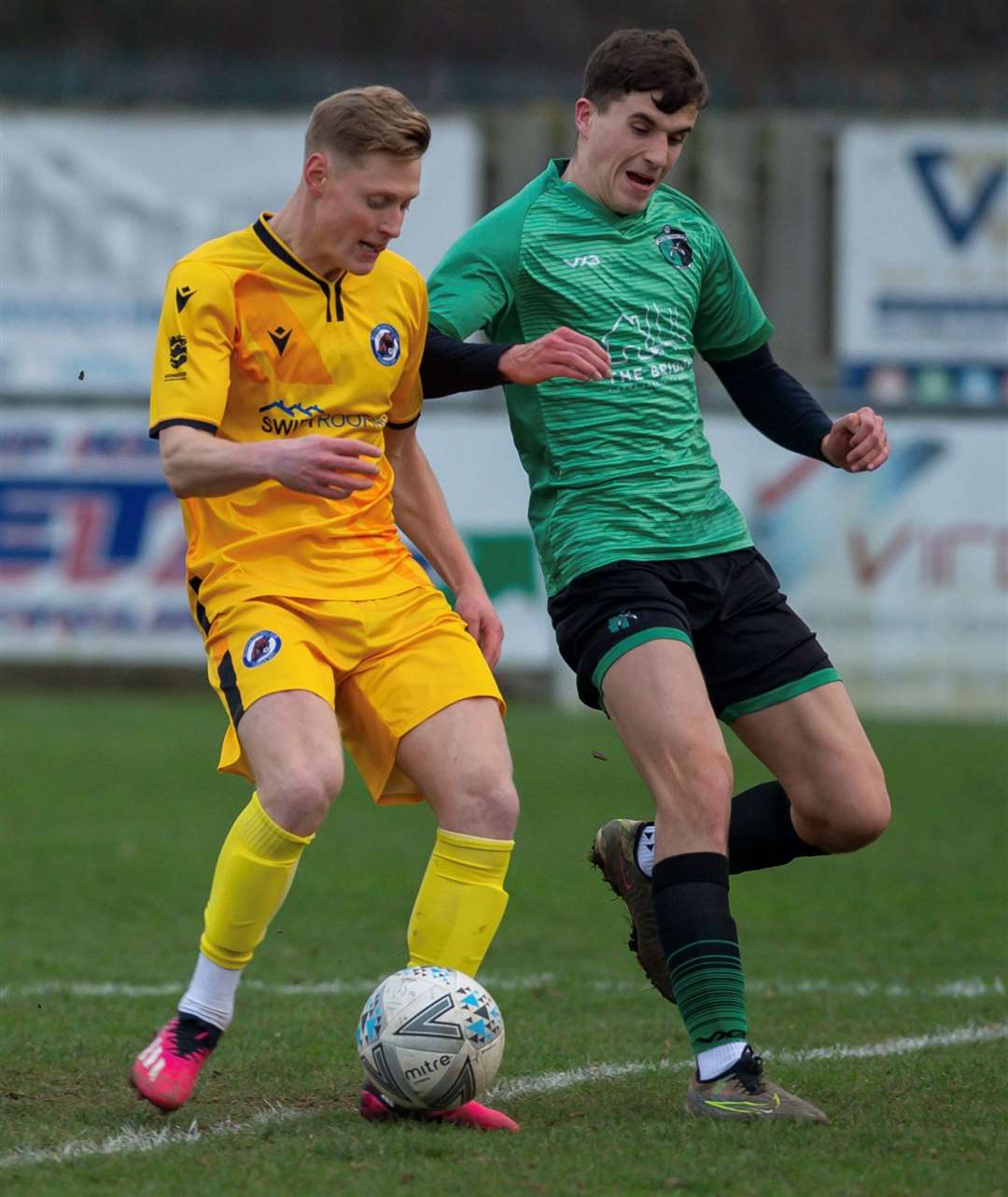 Ollie Freeman (yellow) in action for Bearsted at Welling Town. Picture: Ian Scammell