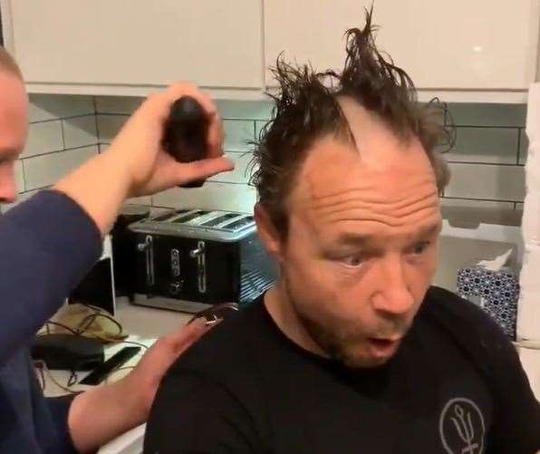 Actor Stephen Graham gets his head shaved by his son
