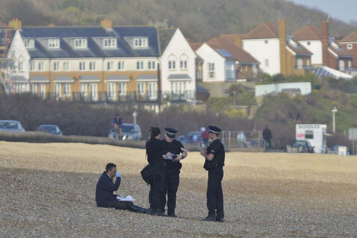 Police on the beach at Hythe where Andrew Barnes was found dead