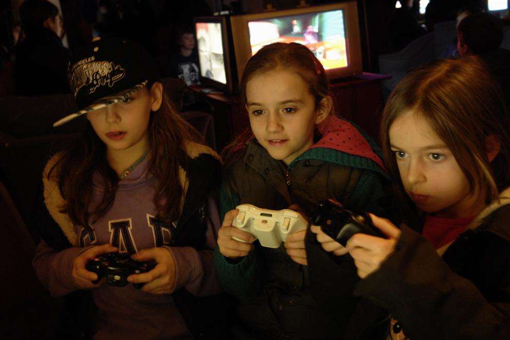 Geek 2013, expo fair at Margate Winter Gardens: Kendra and Leanna Phillips and Ruby Redwood play games