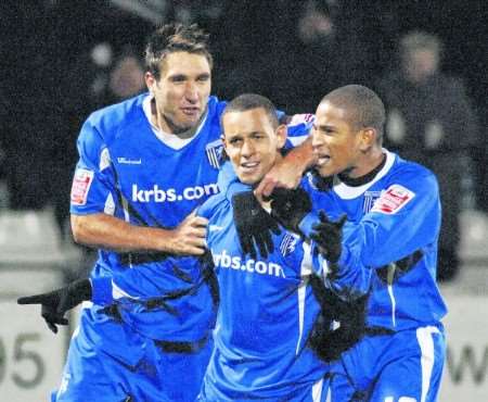 Curtis Weston celebrates his equaliser with Garry Richards (left) and Simeon Jackson. Picture: Grant Falvey