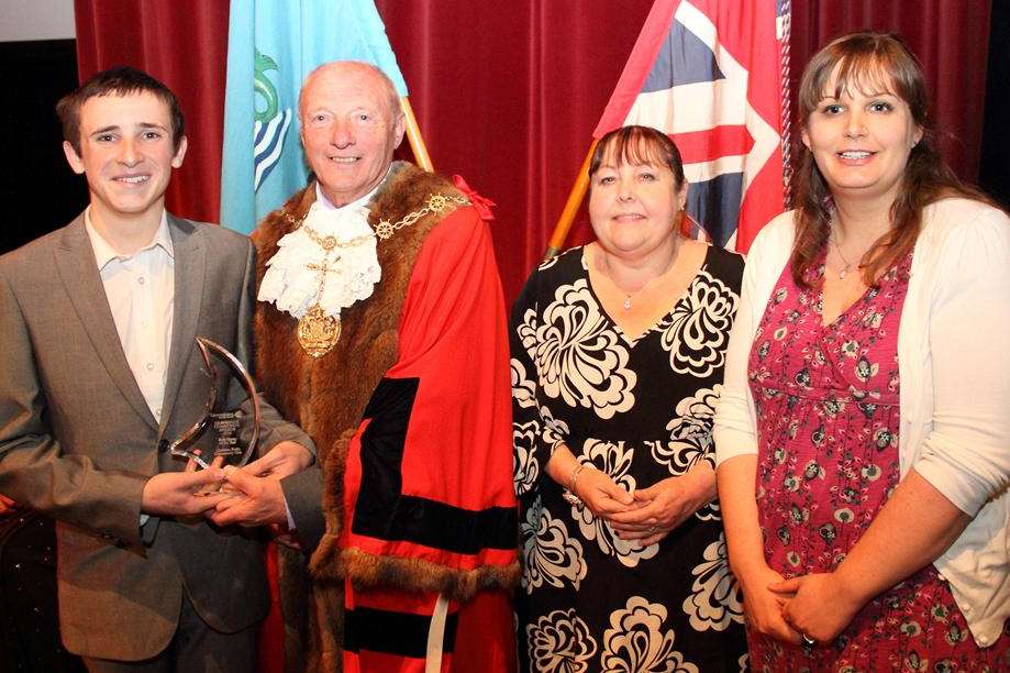 Former mayor Cllr Derek Sales presenting The Best Group of the year to the Christian Fields Community Hub. Picture: Sarah Knight