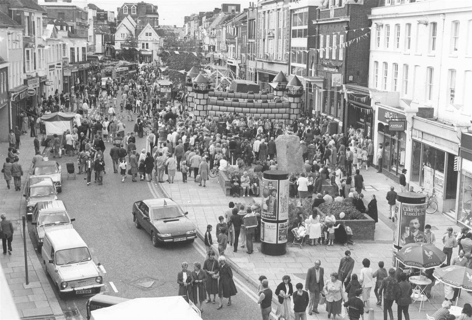 The Lower High Street in Ashford, in 1983, once pulled in big crowds for local events and, of course, shopping. Picture: Images of Ashford by Mike Bennett