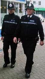 PCs Ben Bowler, left, and Alan Godden look for truants in Faversham