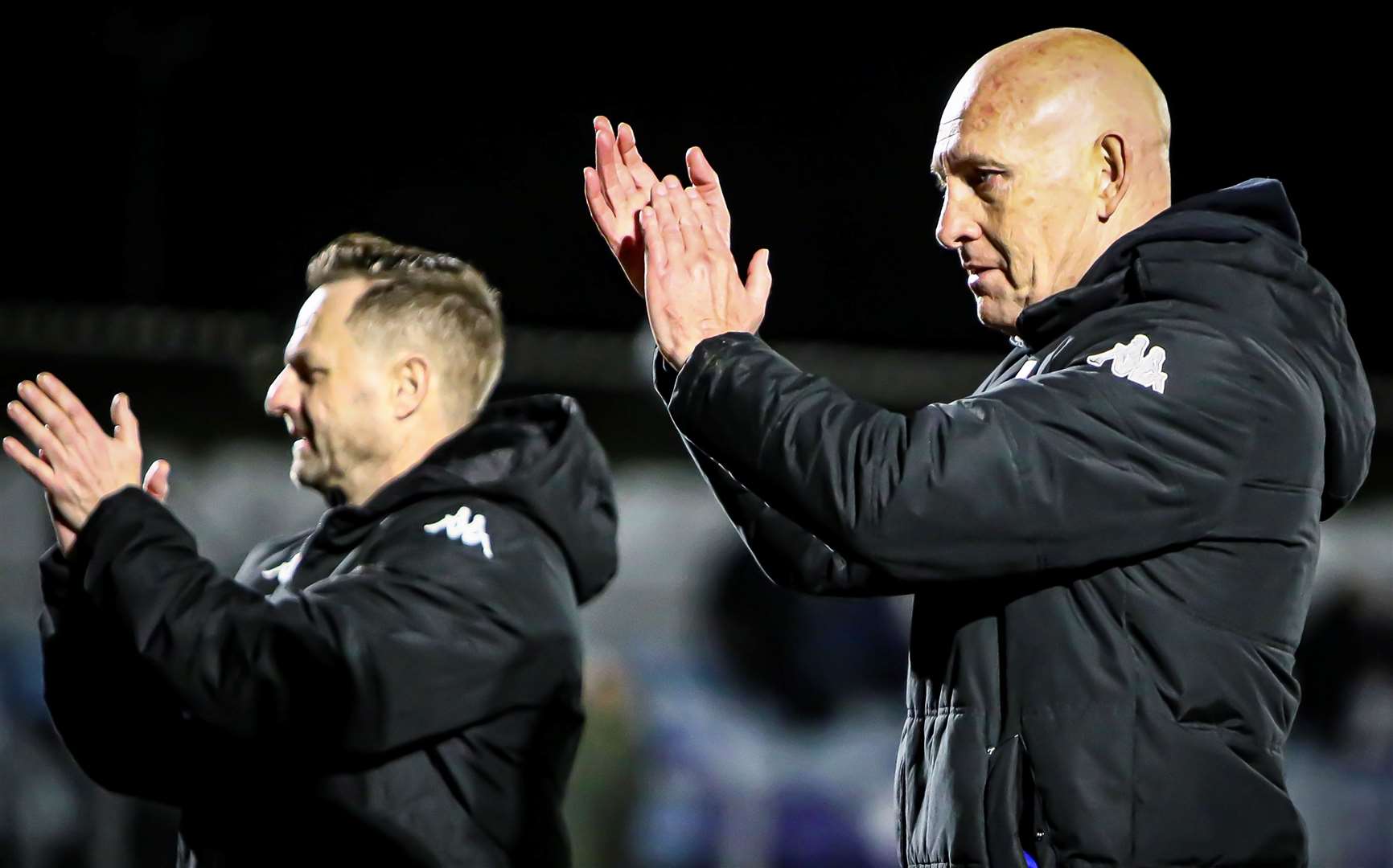 New Margate assistant Colin Reid, left, and manager Mark Stimson applaud the fans at the full-time whistle. Picture: Oakley Photosport