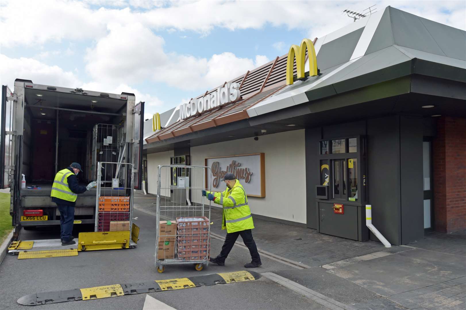 Staff members organise a delivery at a branch of McDonald’s at Boreham, near Chelmsford in Essex, which is one of 15 of the chain’s restaurants to reopen for delivery (Nick Ansell/PA)