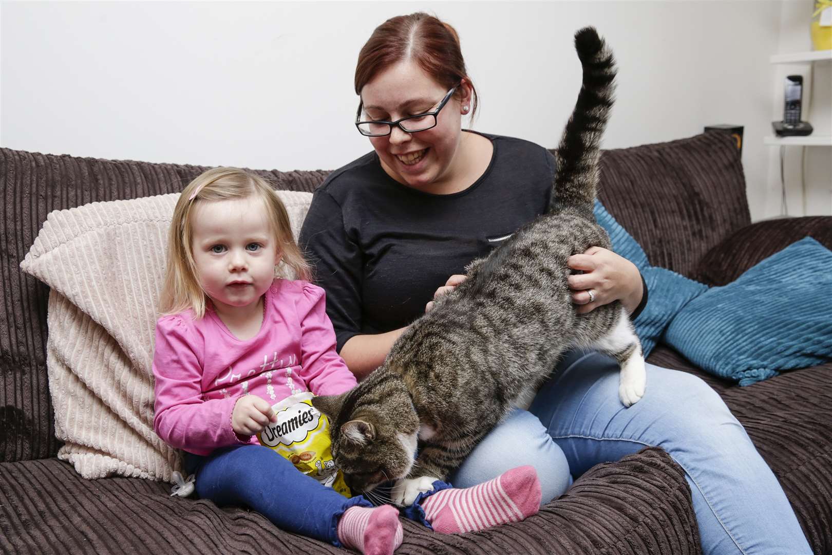 Sophie, aged two, and Stephanie Giffard with Yogi at the family home in Raleigh Close, Gravesend