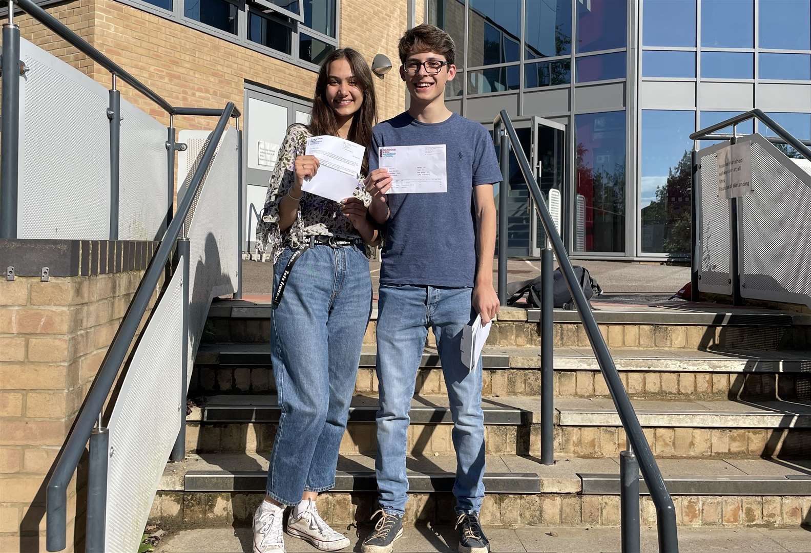 Oakwood Park Grammar School students Kajal Knight, who is head girl and achieved four A*s, with Ryan Mehaffey, who achieved three A*s