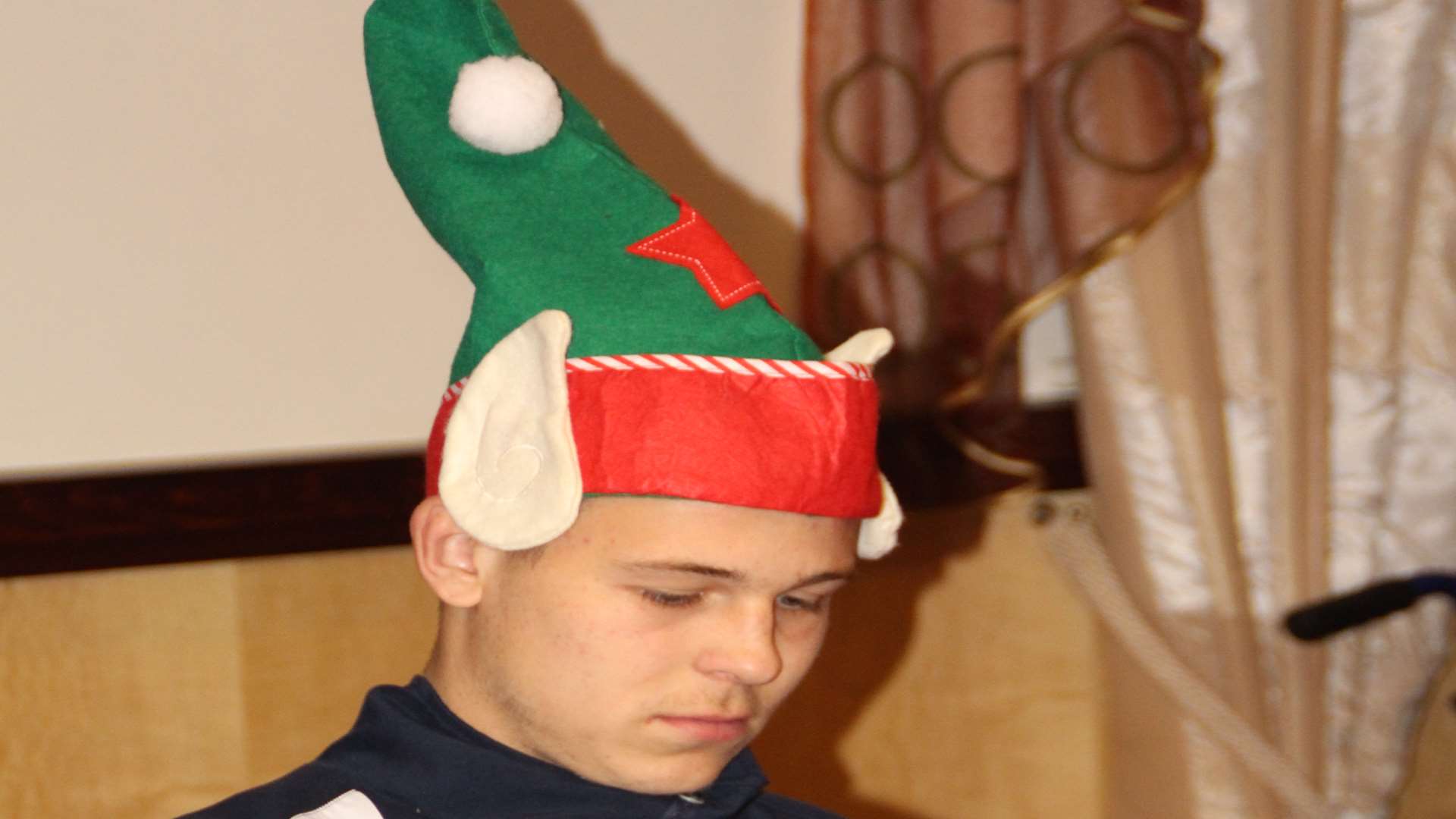 A festive looking Jake Hessenthaler at the club's senior citizens’ party Picture: John Newton