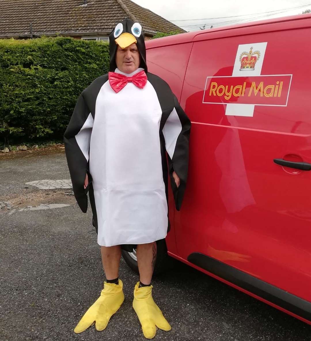 Gary Waller waddled his way through one round dressed as a penguin